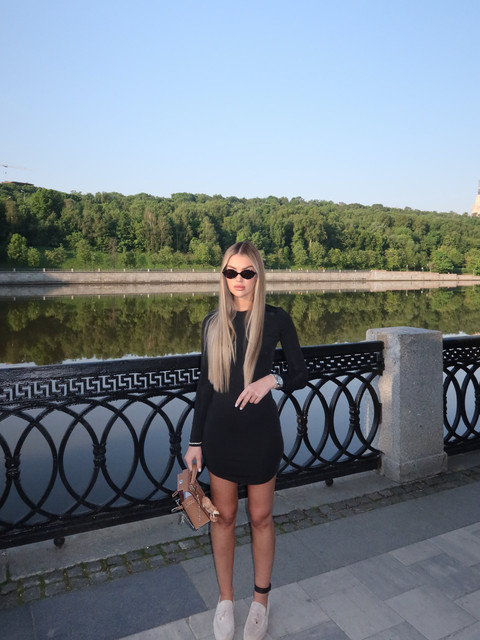 Riverside Chic: Black Mini Dress Outfit and Styling Ideas - Editorial Photoshoot References