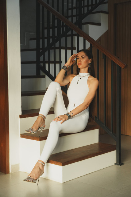 Chic White Jumpsuit & Statement Jewelry: Editorial Photoshoot References