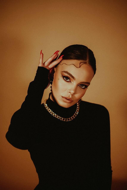 Sophisticated Elegance: Sleek Turtleneck & Gold Chain Photo Set