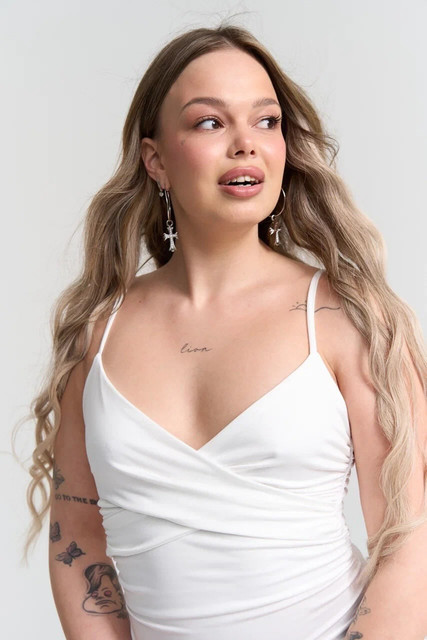 Minimalist Studio Lookbook: White Wrap Top & Cross Earrings Outfit Idea Photo Set